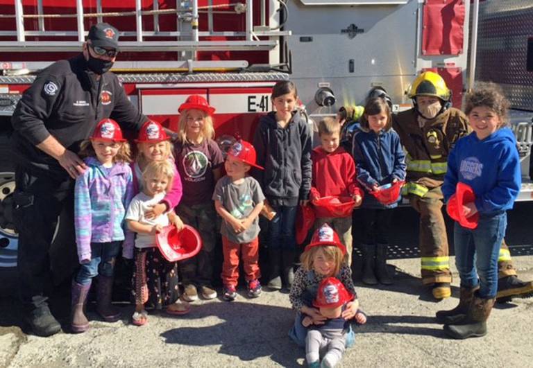 Students Get a Jr Fire Fighter Hat